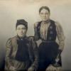 Malvina's mother, Mali Frieder Grunfeld (on right) standing next to her mother.  