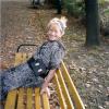 Malvina sitting on a bench, Budapest.