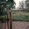 The train tracks in the backyard where Malvina used to sit and read