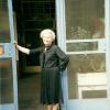 Malvina standing in the doorway of what had been the Nazi run Hungarian government printing office.  The building number is 12 and I do not know the street name.  Malvina went there three times and picked up papers.  The 4th time, she thought they took too long to answer the bell & she left.